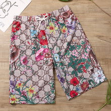 Load image into Gallery viewer, IN STOCK G Flower Swim Trunks
